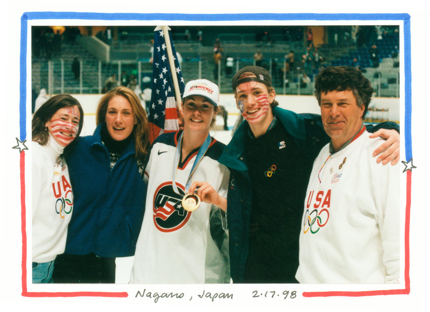 A Mleczko family photo at the 1998 Winter Olympics in Nagano, Japan, following the women&rsquo;s ice hockey gold-medal ceremony. From left is A.J. Mleczko&rsquo;s mother Bambi, her sister Wink, brother Jason and father Tom, who was her first coach in the sport of ice hockey. Four years later she skated for the U.S. women&rsquo;s ice hockey team in Salt Lake City and brought home a silver medal.