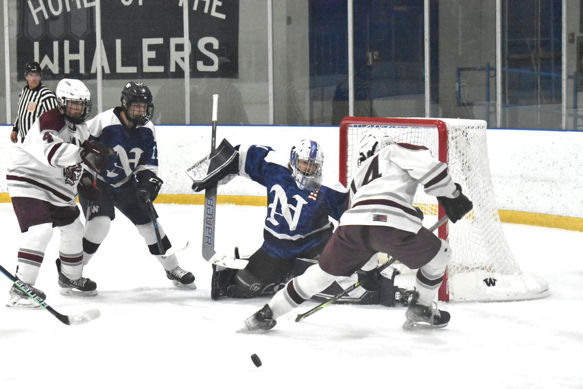Goalie Griffin Starr makes a save Feb. 11 against Bishop Stang. The junior was named Cape &amp; Islands League Lighthouse Division MVP, one of seven Whalers to earn postseason honors.