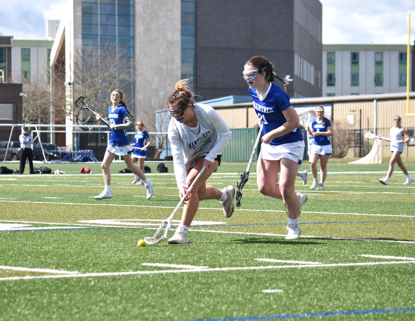 Emerson Pekarcik scoops up a ground ball during Sunday&rsquo;s scrimmage against Braintree at Massachusetts Maritime Academy.