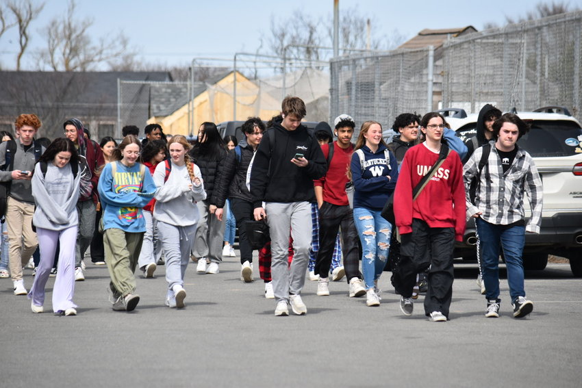 NHS students participated in a walkout Friday in protest of recent anti-LGBTQ legislation.