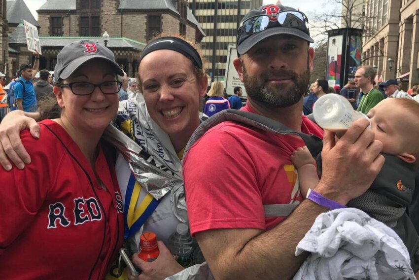 Kelsey Perkins (center) and family at the finish line of the Boston Marathon in 2017.