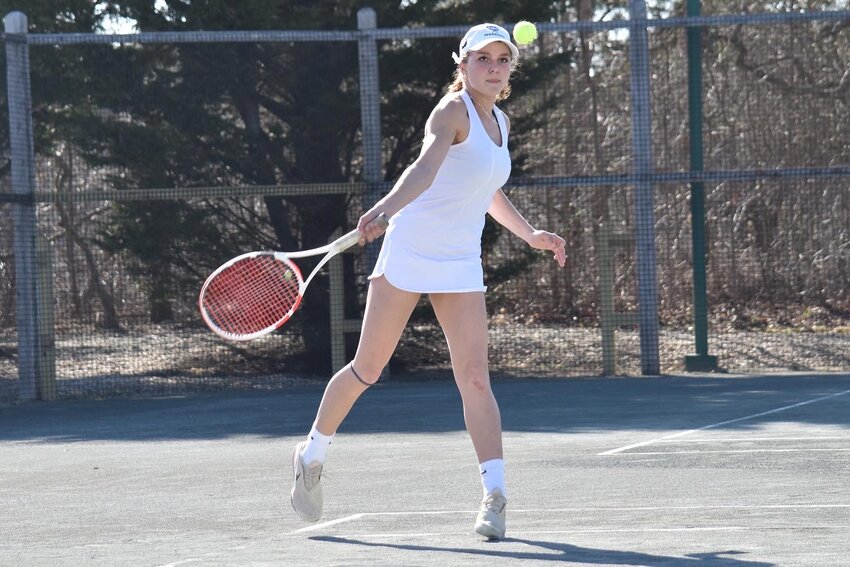 Sara Dussault returns a serve during the Whalers&rsquo; April 13 match against Rising Tide.