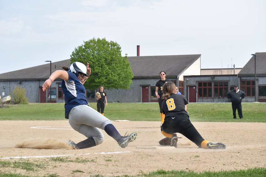 Allyson Escobar slides into third base during the Whalers&rsquo; doubleheader against Boston Latin Academy Saturday.