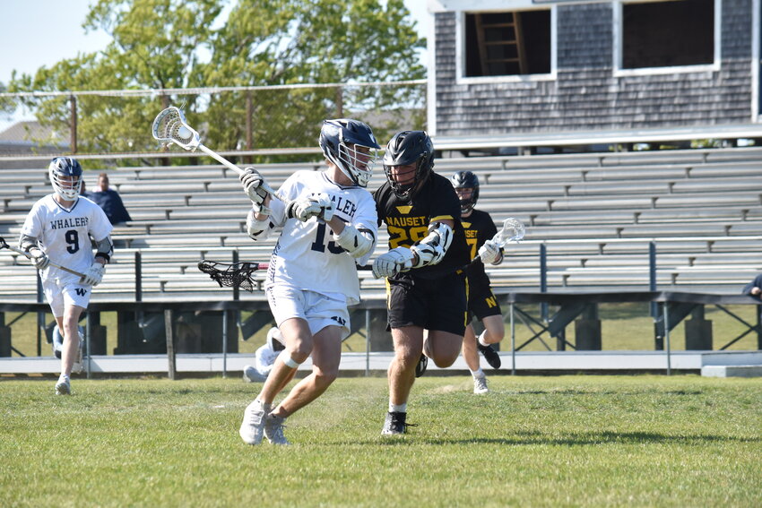 Ryan Davis looks for a shot during Thursday's 16-6 loss to Nauset. The junior tied for the team-high with two goals.