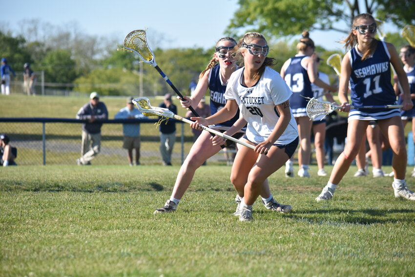 Cydney Mosscrop looks for a pass during the Whalers' 20-3 win Thursday against Cape Cod Academy. The junior finished with two goals and three assists.