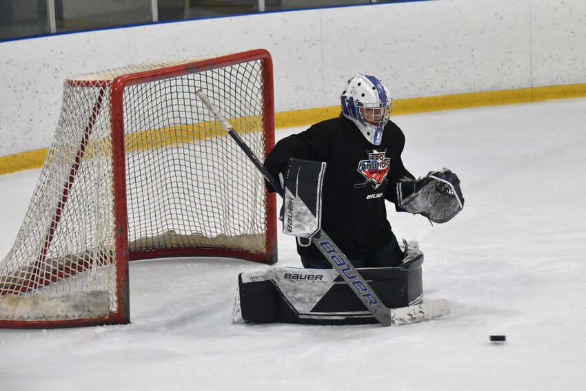 Griffin Starr makes a save in net during Wednesday's Nobadeer Selects men's hockey league game.