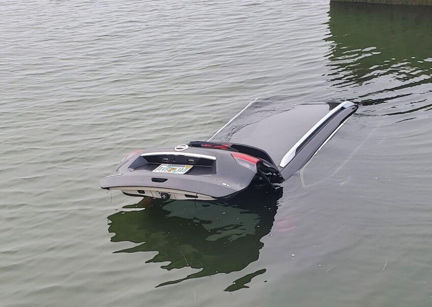 A Nissan Rogue submerged in Nantucket Harbor near the Children's Beach Boat Basin Sunday morning.