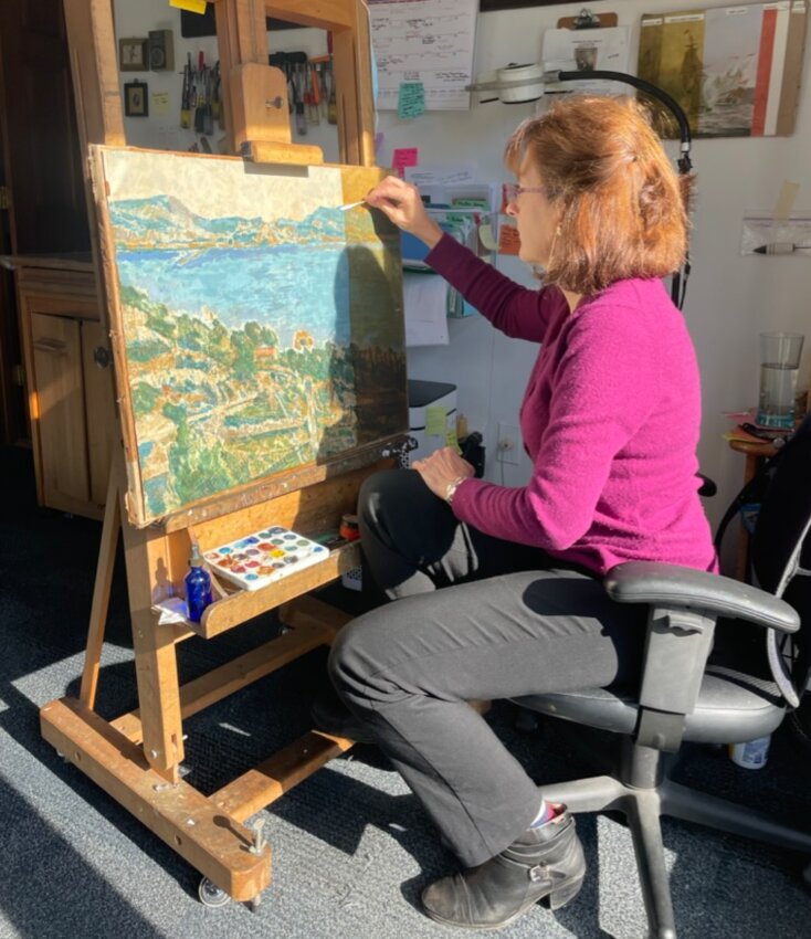 &ldquo;The Nantucket painting&rdquo; being cleaned in June by Theresa Carmichael of Carmichael Art Conservation in Bedford.