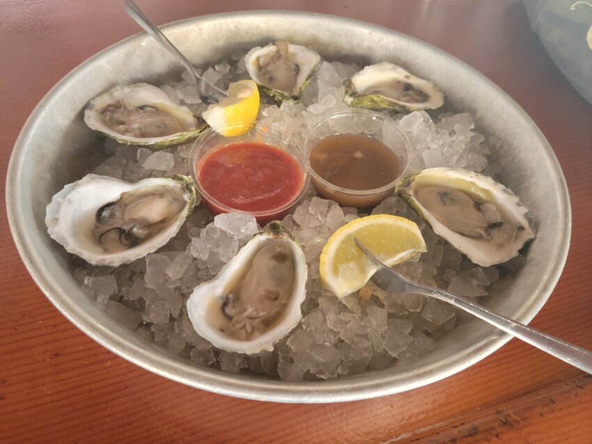 Sandbar rotates its selection of local oysters weekly, including Pocomo Meadow.