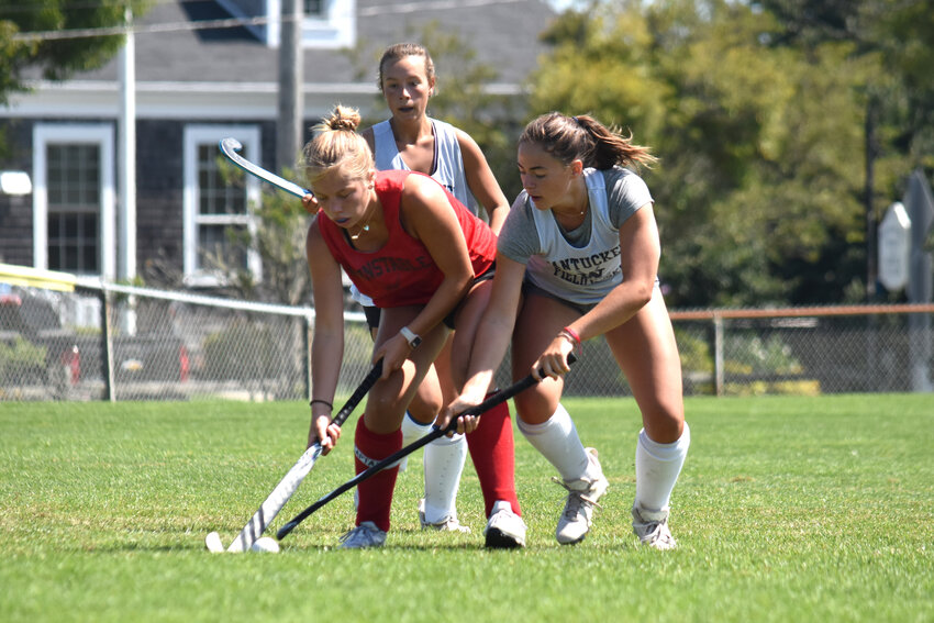 Sam Zadroga, right, and a Barnstable player battle for possession during last Thursday&rsquo;s scrimmage.
