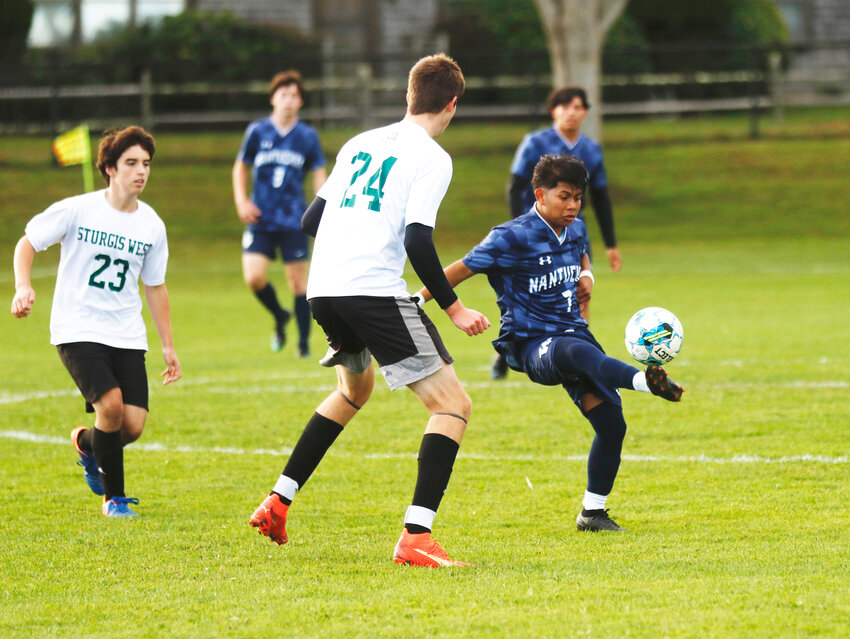 Elvis Alonzo juggles the ball during Tuesday&rsquo;s 7-2 win against Sturgis West.