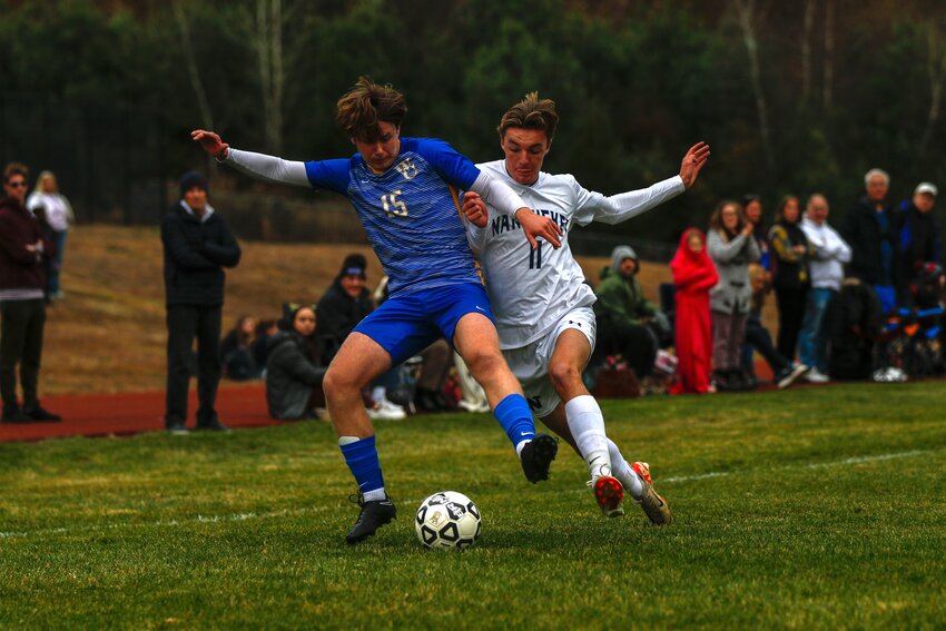 Jake Johnson and a Whitinsville Christian player battle for possession during the Whalers' 3-2 loss Monday in the Div. 4 state tournament round of 32.