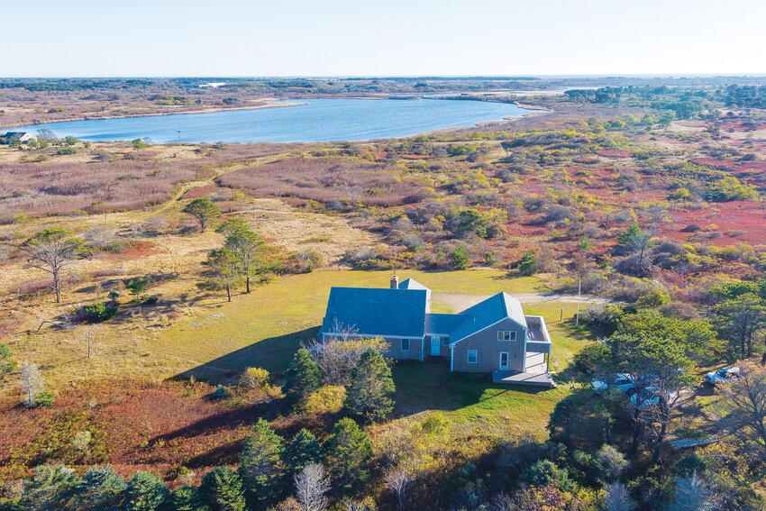 Set on over an acre of land off prestigious Eel Point Road, this one-of-a-kind property includes a three-bedroom, twoand- a-half-bathroom Cape-style house and a one-bedroom, one-and-a-half-bathroom apartment above the garage.