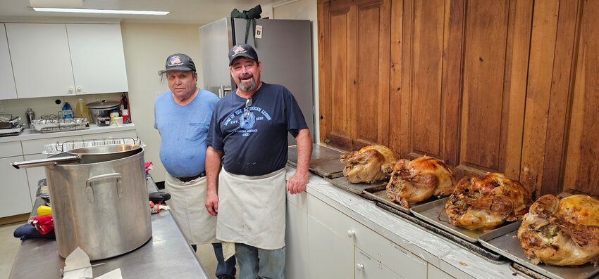 From left, American Legion post members Bill Medeiros, Jim Patterson and Bill Cardelli prep for the annual Babe Patterson Thanksgiving dinner.