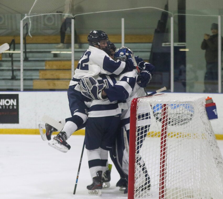 The Whalers celebrate after a 3-1 win over Framingham at home Saturday.