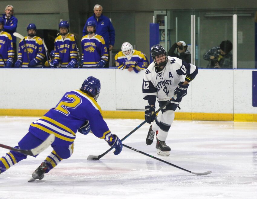 Ryan Davis (12) looks for a shot during the Whalers' 7-1 win over St. John Paul II Monday. The senior led Nantucket with three goals in the win.