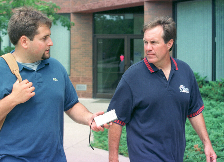 Former Inquirer and Mirror sports editor Ethan Butterfield interviews Patriots head coach Bill Belichick during spring training in August 2000.