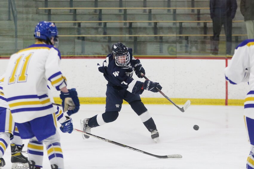 Colby O'Keefe takes a shot during the Whalers' 6-1 win Monday against St. John Paul II.