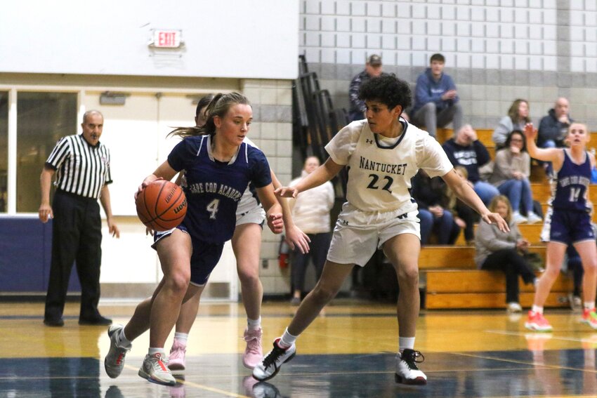 Mani Taveras (22) defends Cape Cod Academy&rsquo;s Lili Shanahan during the Whalers&rsquo; 35-30 win Friday.