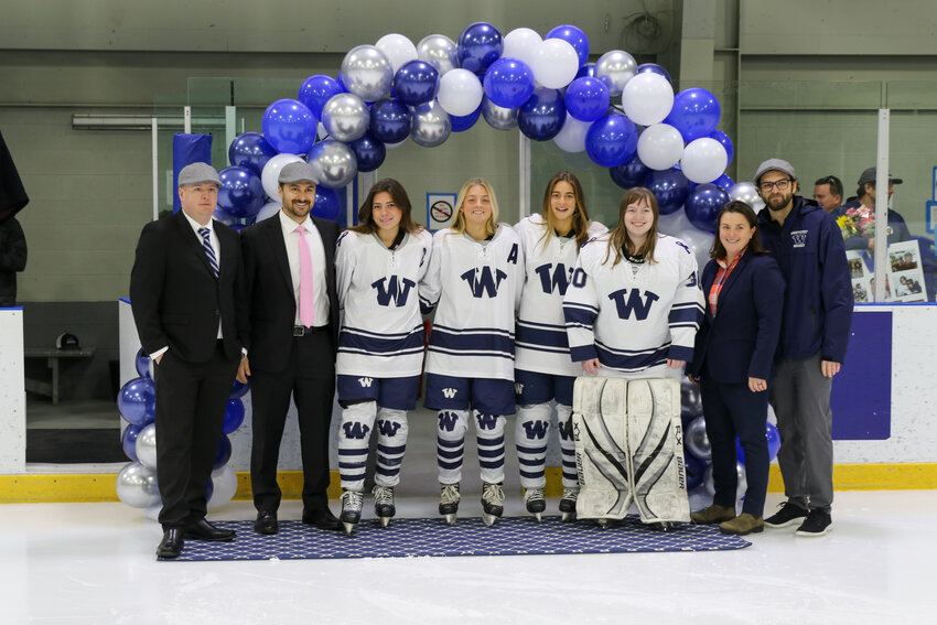 From left, head coach Andy McNeilly, assistant coach Max Perkins, Emerson Pekarcik, Bailey Lower, Claire Misurelli, Siena Monto, assistant coach Cassie Thompson and assistant coach Cory Tibbetts ahead of Wednesday's senior night game against Dennis-Yarmouth.