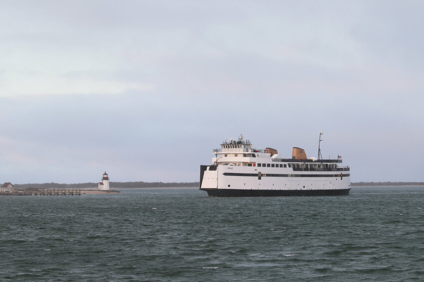 The Steamship Authority&rsquo;s M/V Eagle makes its way past Brant Point through an empty Nantucket harbor.