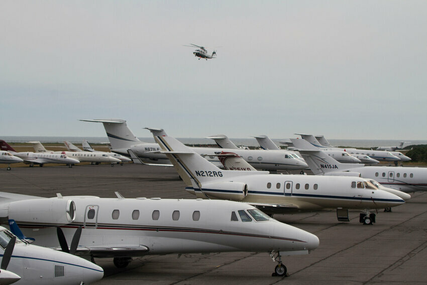 The tarmac at Nantucket Memorial Airport on a busy summer weekend, packed with private jets.