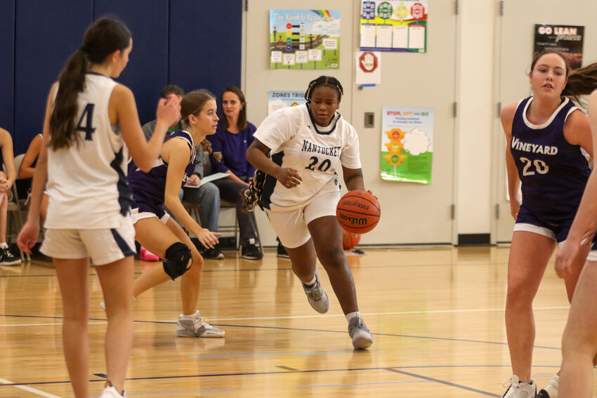 Ritanya Phillips drives to the basket in the JV girls' basketball game against Martha's Vineyard Dec. 9.