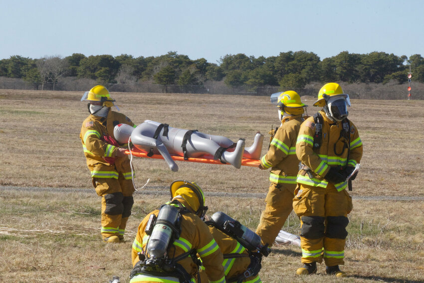 Airport firefighters during a full-scale emergency drill in 2021.