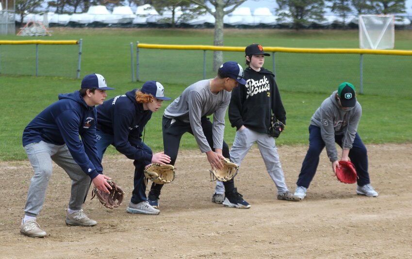 The varsity basbeall team hosted a clinic for Little League players Sunday at the Delta Fields.