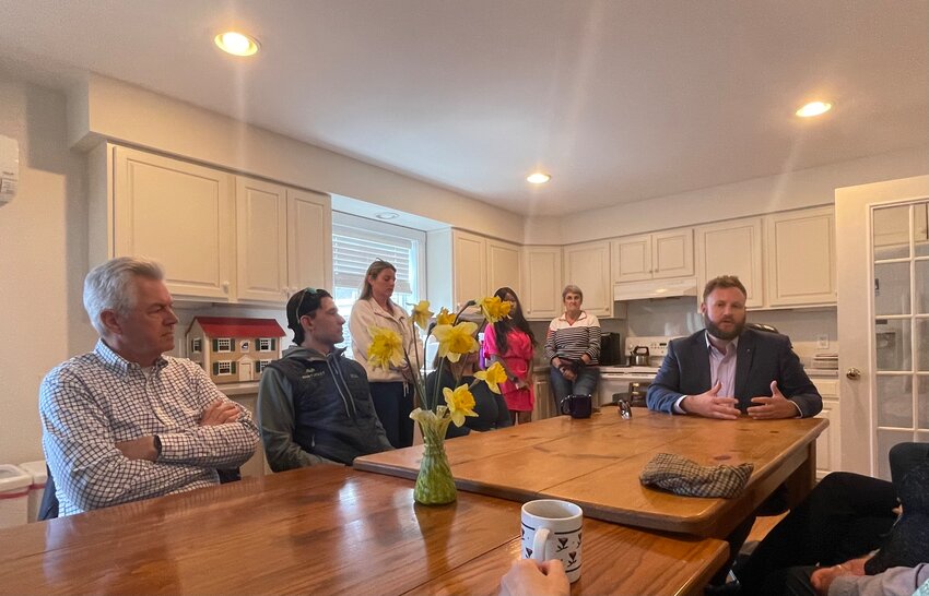 Senator Julian Cyr speaks with members of island housing organizations and town officials inside the Housing Nantucket offices Friday afternoon.