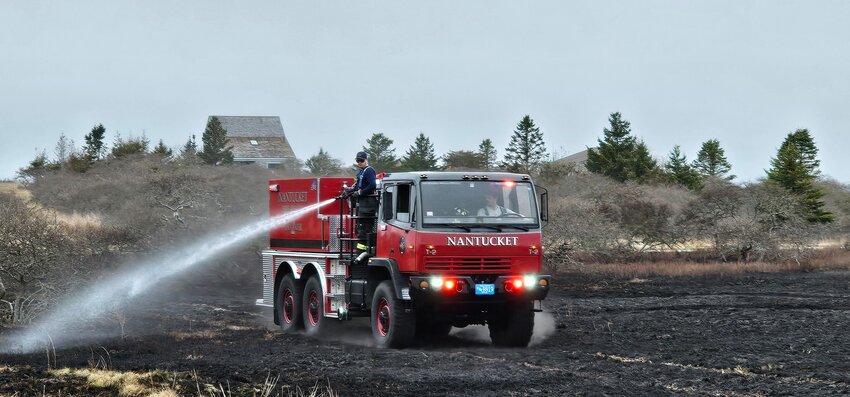 Nantucket firefighters put out a brush fire off Milestone Road Sunday afternoon.