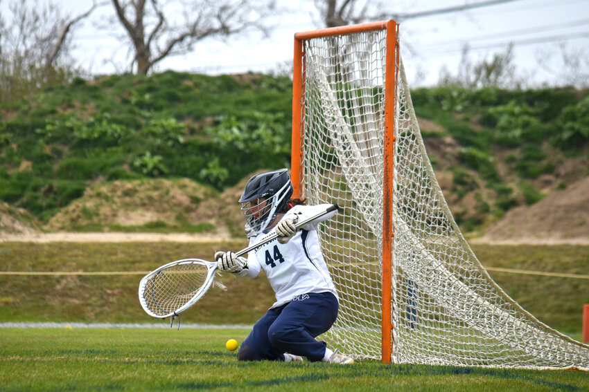 Whalers goalie Claire Misurelli makes a save during the girls lacrosse team&rsquo;s 14-7 win Sunday over Ashland.