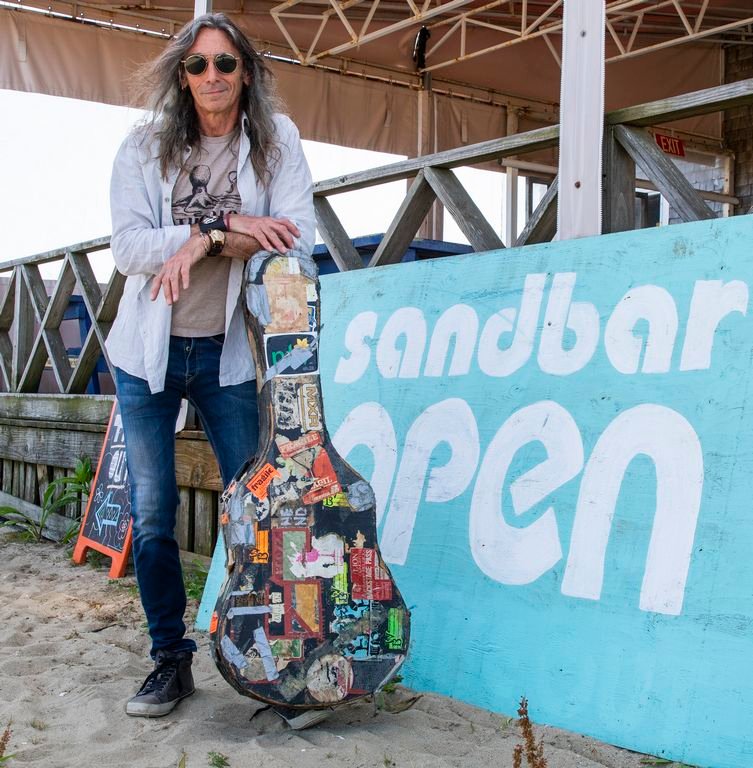 Jeff Ross has a standing gig Monday and Friday nights at Sandbar this summer now that solo acts have been allowed to resume playing for outdoor dining. Right: Singer-songwriter Sean Lee at Brant Point.