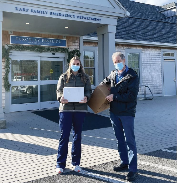 Nantucket Cottage Hospital pharmacy manager Dave Small and staff pharmacist Katherine Wilbur outside the emergency department with Nantucket's first shipment of COVID-19 vaccine.