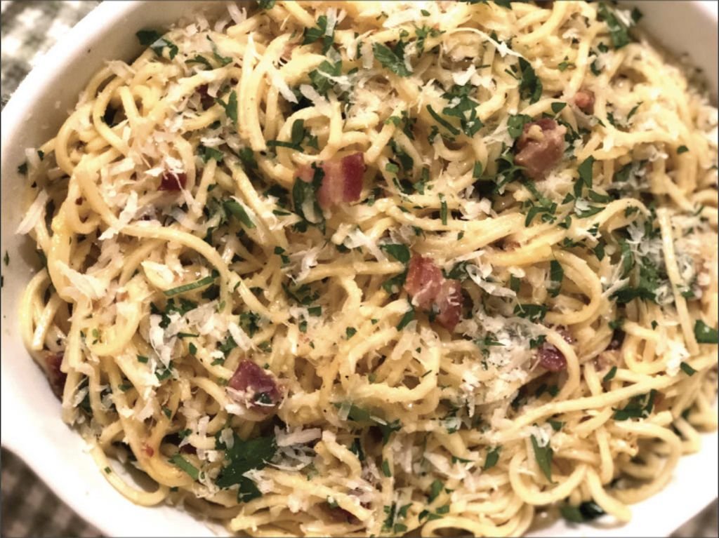 A favorite dinner after shopping for Italian specialties on Federal Hill in Providence, R.I. is Spaghetti alla Carbonara, made with guanciale and plenty of freshly-grated Parmigiano-Regianno and Pecorino Romano cheeses.