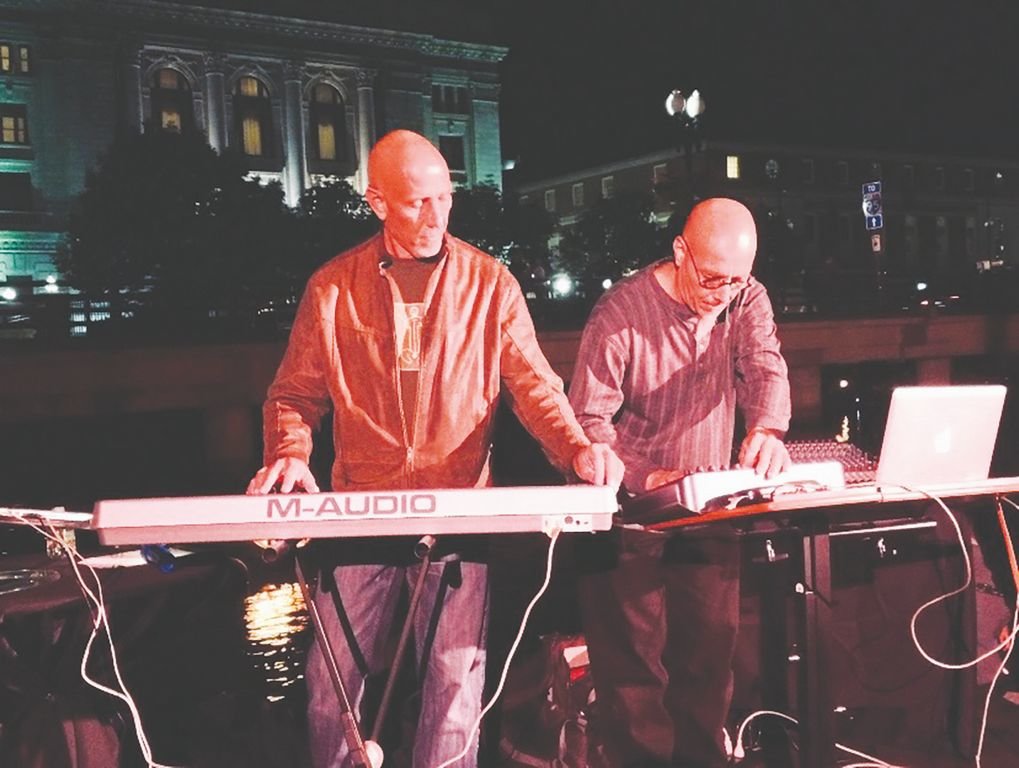 Francisco, left, and Miguel Noya performing outdoors in Providence, R.I.