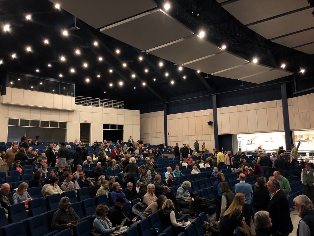 Voters file into the Nantucket High School auditorium Tuesday night for the second night of the 2019 Annual Town Meeting.