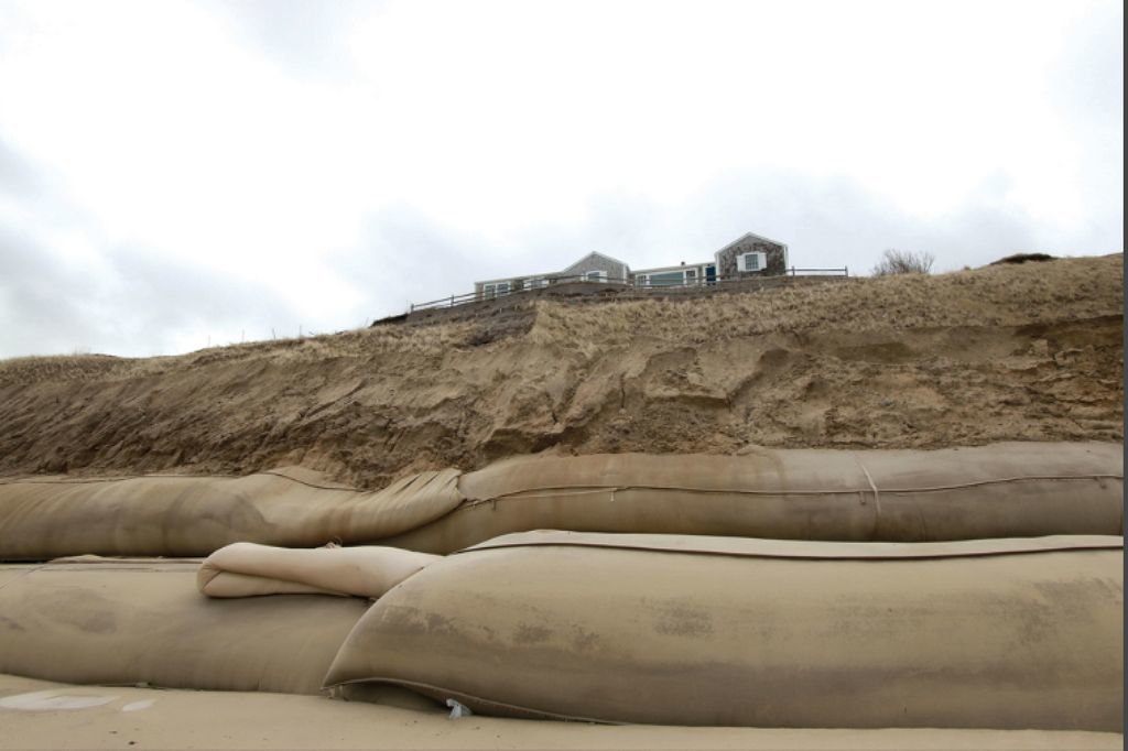The bluff along Baxter Road in Sconset following a winter storm in March 2018 that exposed the geotubes on the beach below. These sand-filled tubes are usually covered in sand, protecting the toe of the bluff. The Conservation Commission last month denied an expansion of the project.