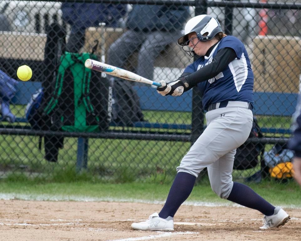 Madlyn Lamb connects with the ball in Nantucket's 23-4 win over Rising Tide.