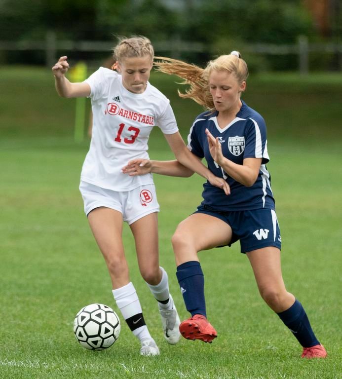 Ruby Dupont, right, fights for possession of the ball in the Whalers' 4-1 home loss to Barnstable last Thursday.