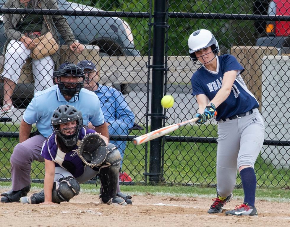 Marina Caspe connects for a hit in Nantucket's 11-8 playoff loss to Bourne.