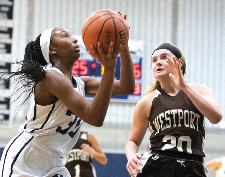 Whaler Malika Phillip drives to the basket in Nantucket's 52-48 loss to Westport in  the Div. 4 South Sectional first round Wednesday.