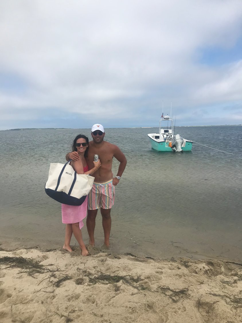 “We were engaged on the harbor in Wauwinet in July 2019 and we were married on the same beach in September 2020.  We had an intimate ceremony for our families, with friends and onlookers watching from their boats.  With the new work from home arrangements, we have been able to spend much more time in the off season quarantined out in Wauwinet.”