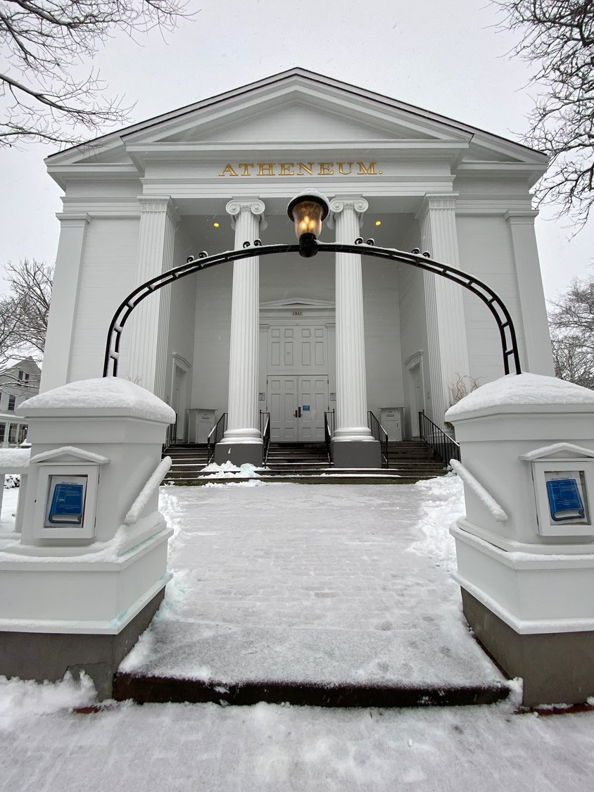 The snow-covered walk leading to the Nantucket Atheneum.