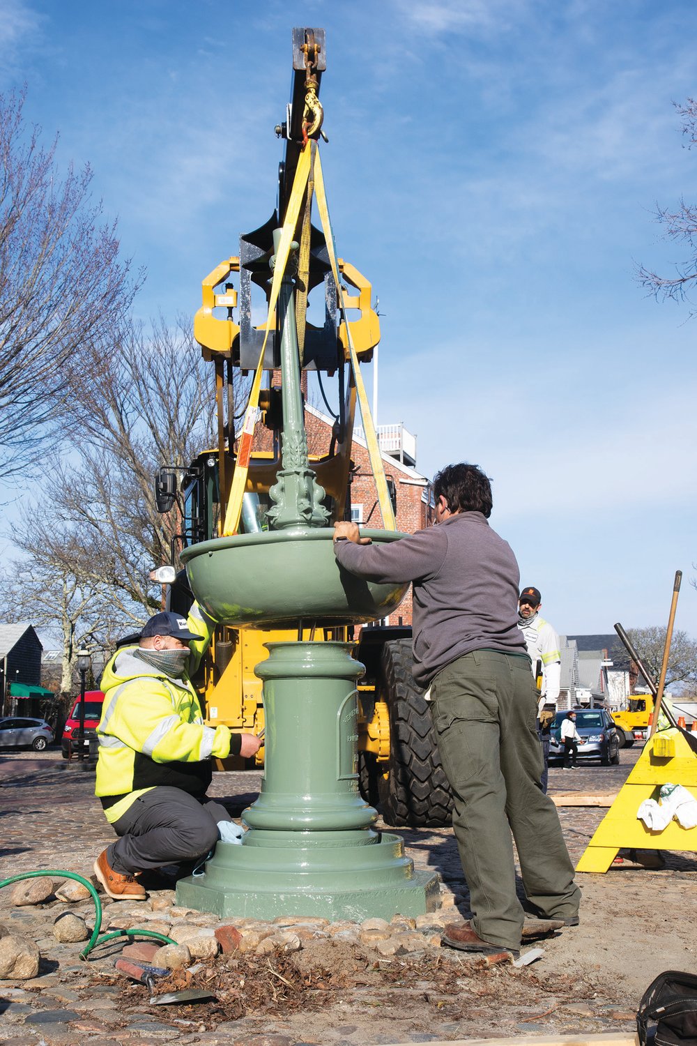 The Max T. Wagner horse fountain returned to its rightful place at the foot of Main Street last Thursday, a little over a year after a driver smashed into it, knocking it down, claiming he was blinded by the sun and didn’t see it.