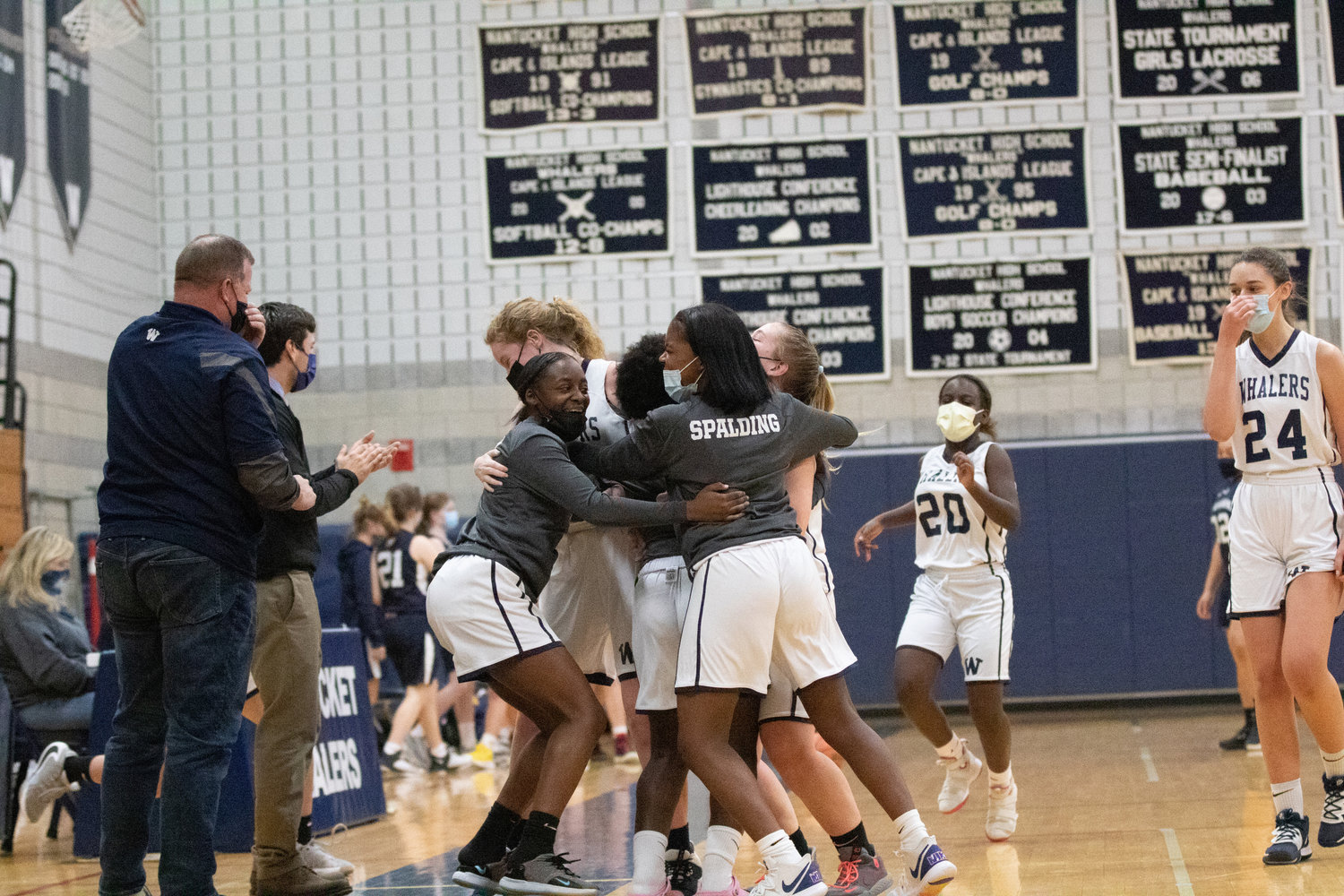 Lady Whalers celebrate first win of season