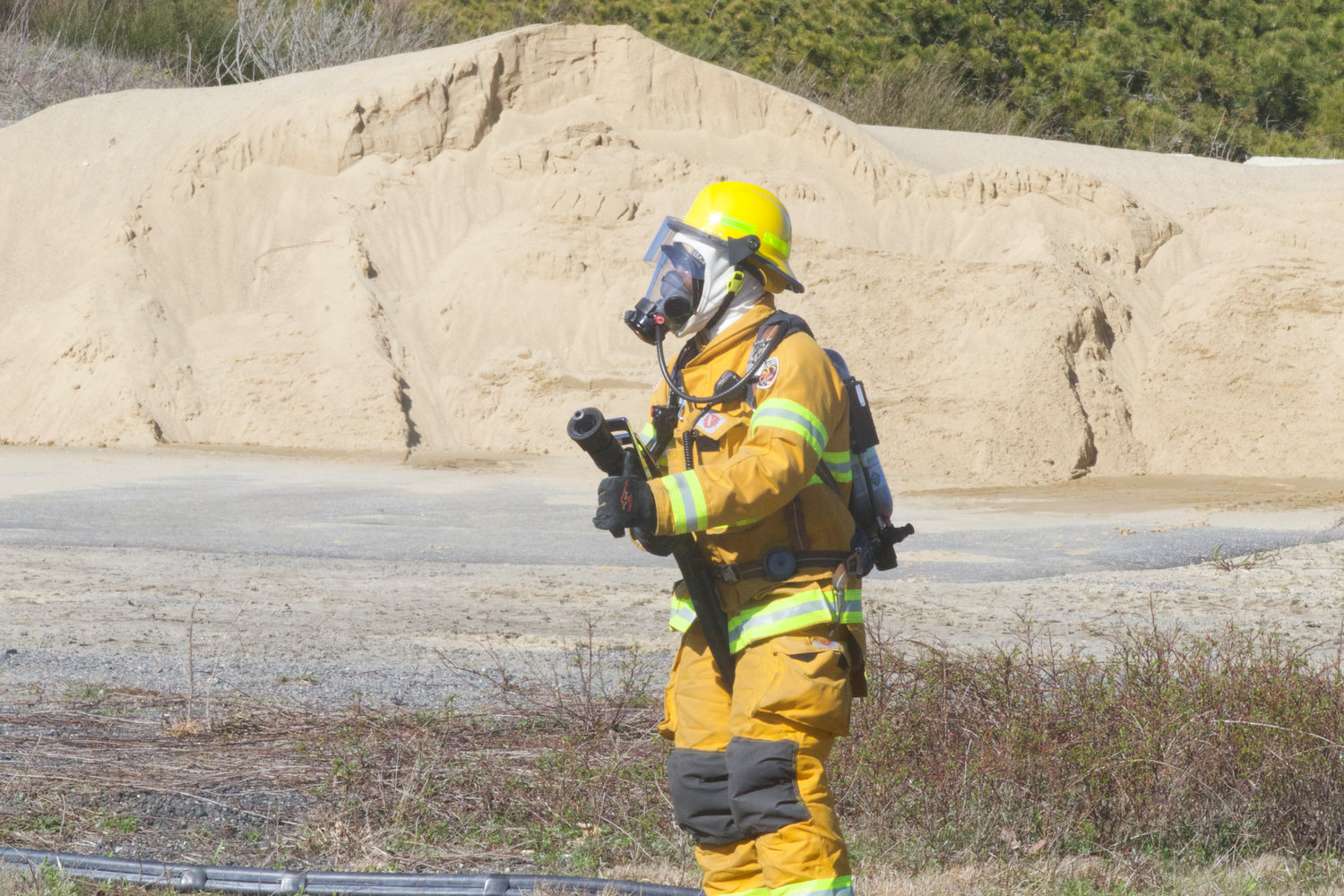 A Nantucket firefighter during an airport emergency response drill Monday.