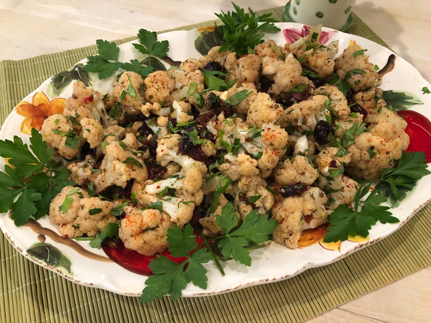 Fruity, spicy and salty Calabrian chiles make this cauliflower salad with capers and olives a summer favorite.