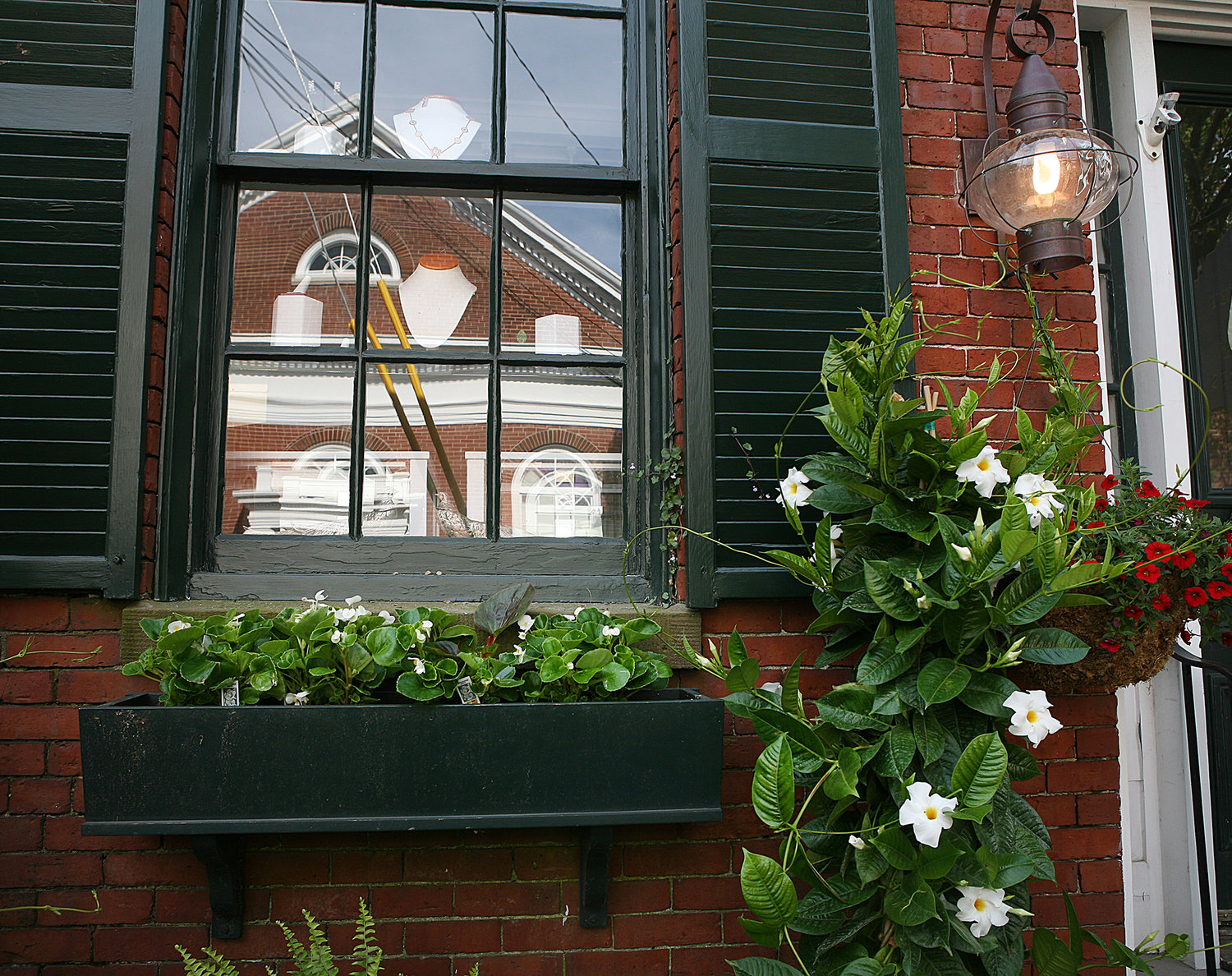 MAY 23, 2021 -- A window box and other flowers outside Nantucket Estate Jewelry and Fine Arts on Orange Street.