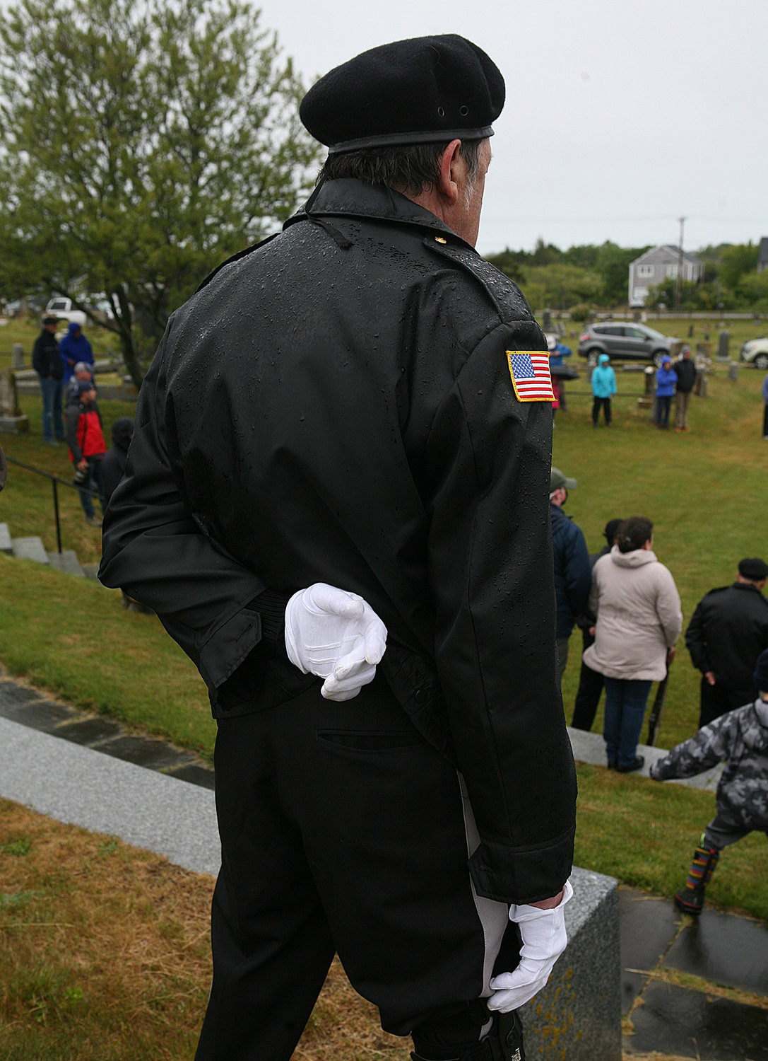 Memorial Day Ceremony at Prospect Hill Cemetery. Tom Coffin, a member of the sons of the American Legion, observes the Ceremony on Sunday.
